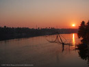 Sunrise over a Kerala backwater river.