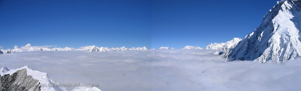 The view from the top of Island Peak. View over to Peak 41 (6623 m), Mera Peak (6476 m), Peak 6413, Chhukhung Peak 6430